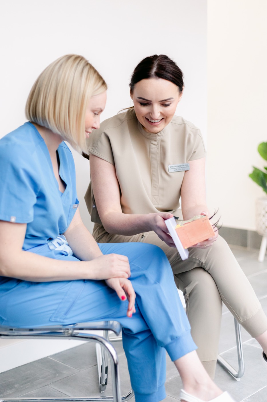 Sarah reviewing treatment options one-to-one with a practitioner